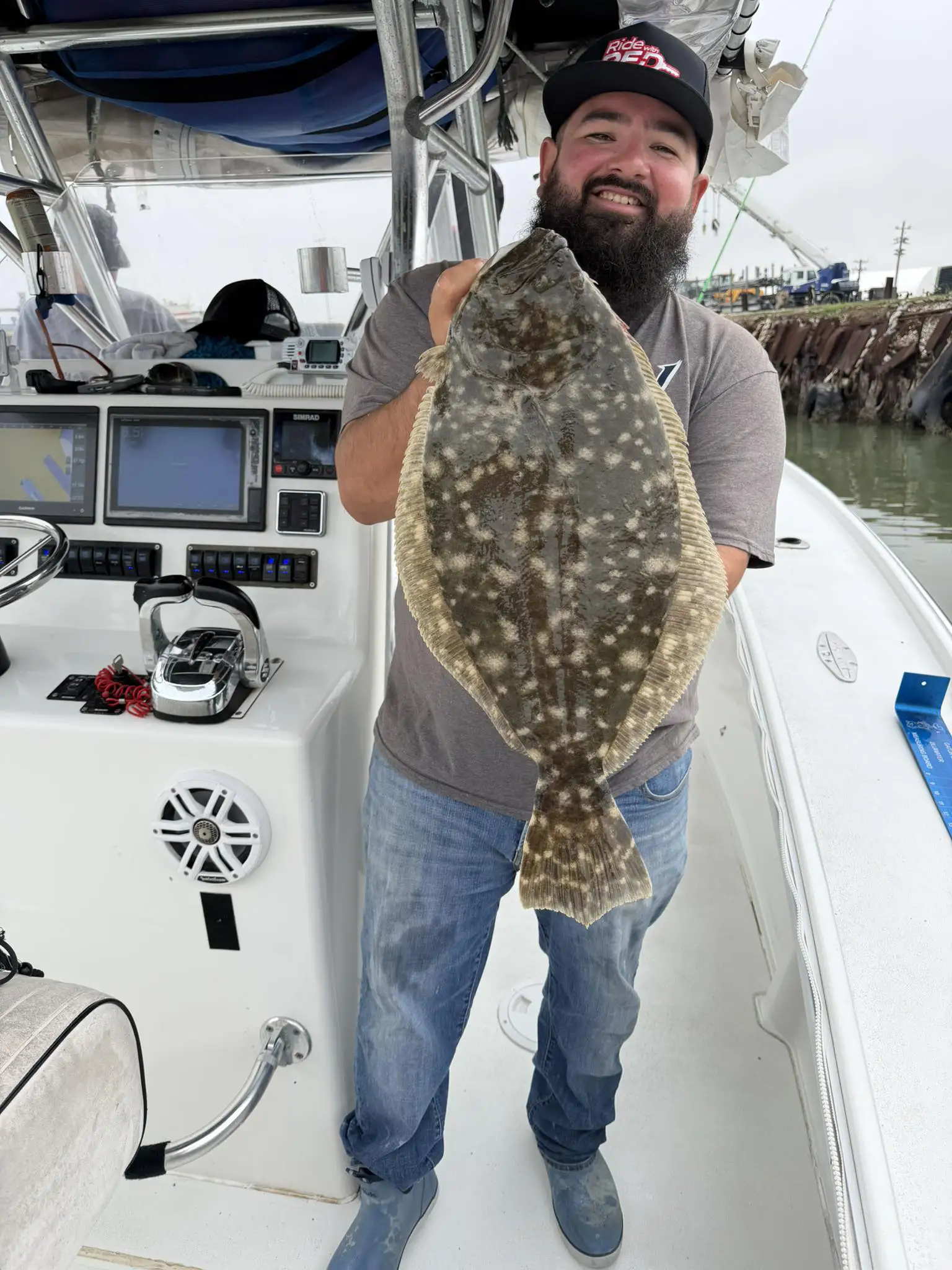 Rod and reel detail with open water in the background
