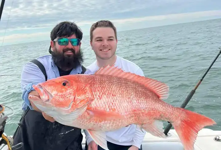 Nearshore Galveston fishing charter heading past the jetties